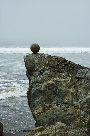 Noon, Stinson Beach, California. Sand globe on rock. Climbing the rock with the ball in one hand, I’m afraid I’ll drop it. As I perch on top of the rock and bend down to balance the globe, I feel afraid I’ll fall. 2006.
