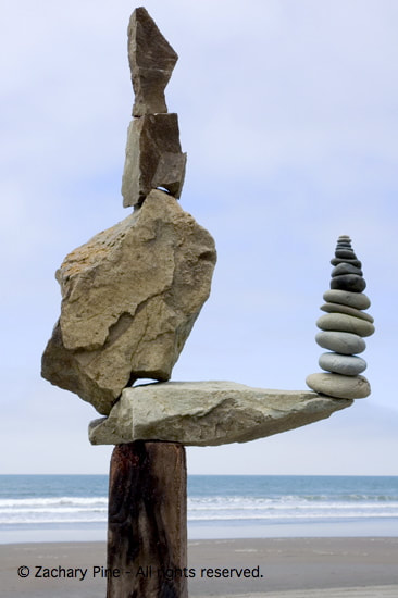 Afternoon, Stinson Beach, California. Rocks on driftwood. The rough rocks sound like sandpaper on each other; the smooth rocks sound like marbles clicking. 2005.